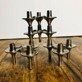 Modular chrome metal candle holders by Nagel & Stoffi. Set of 4