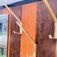Vintage wall coat rack with storage bench from the 1970s.