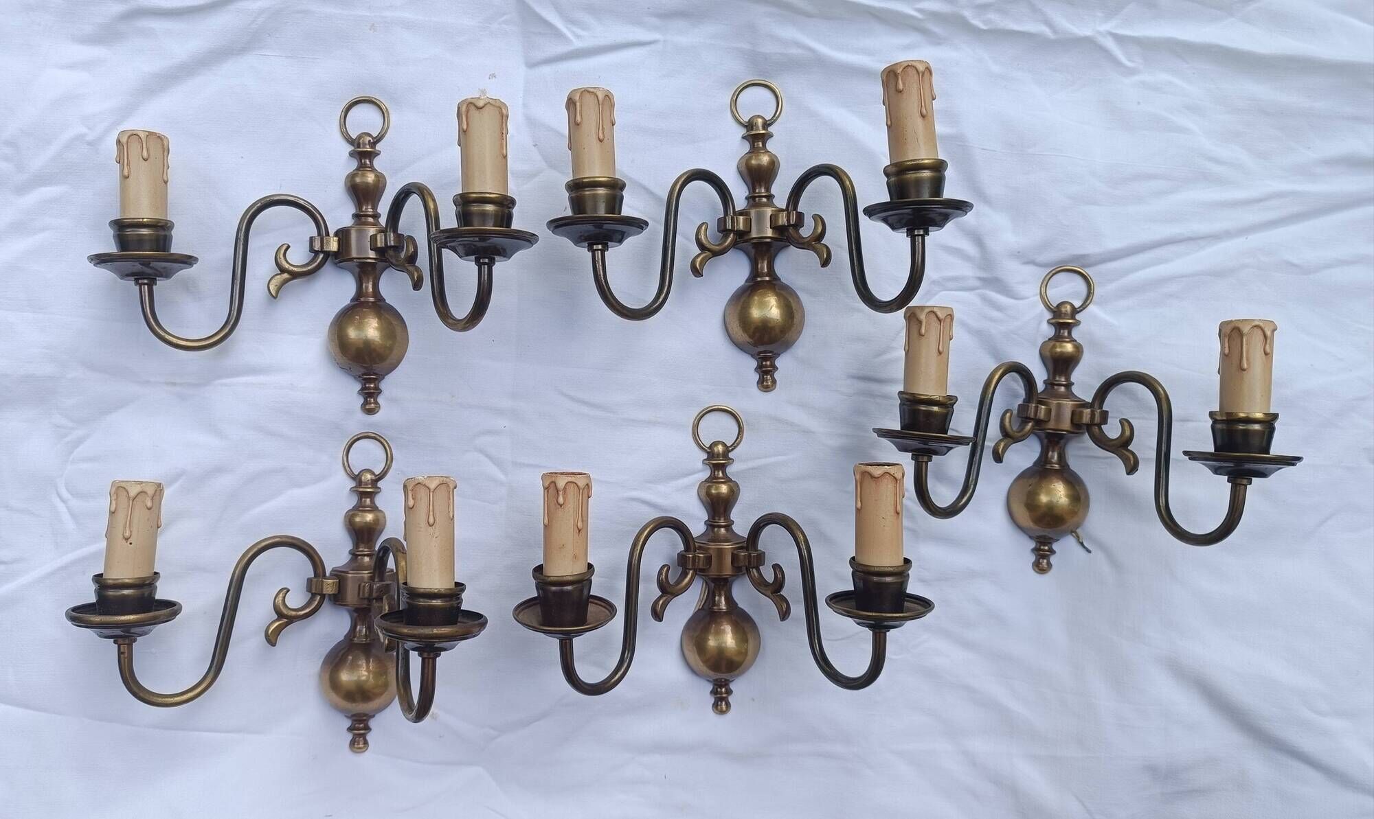 Set of 5 identical wall sconces in aged bronze, Dutch style.