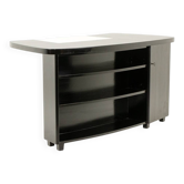 Bureau Art Déco de forme rognon, en bois laqué noir. Années 1930.