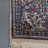 Hand-knotted rug with patterns – 232x139cm