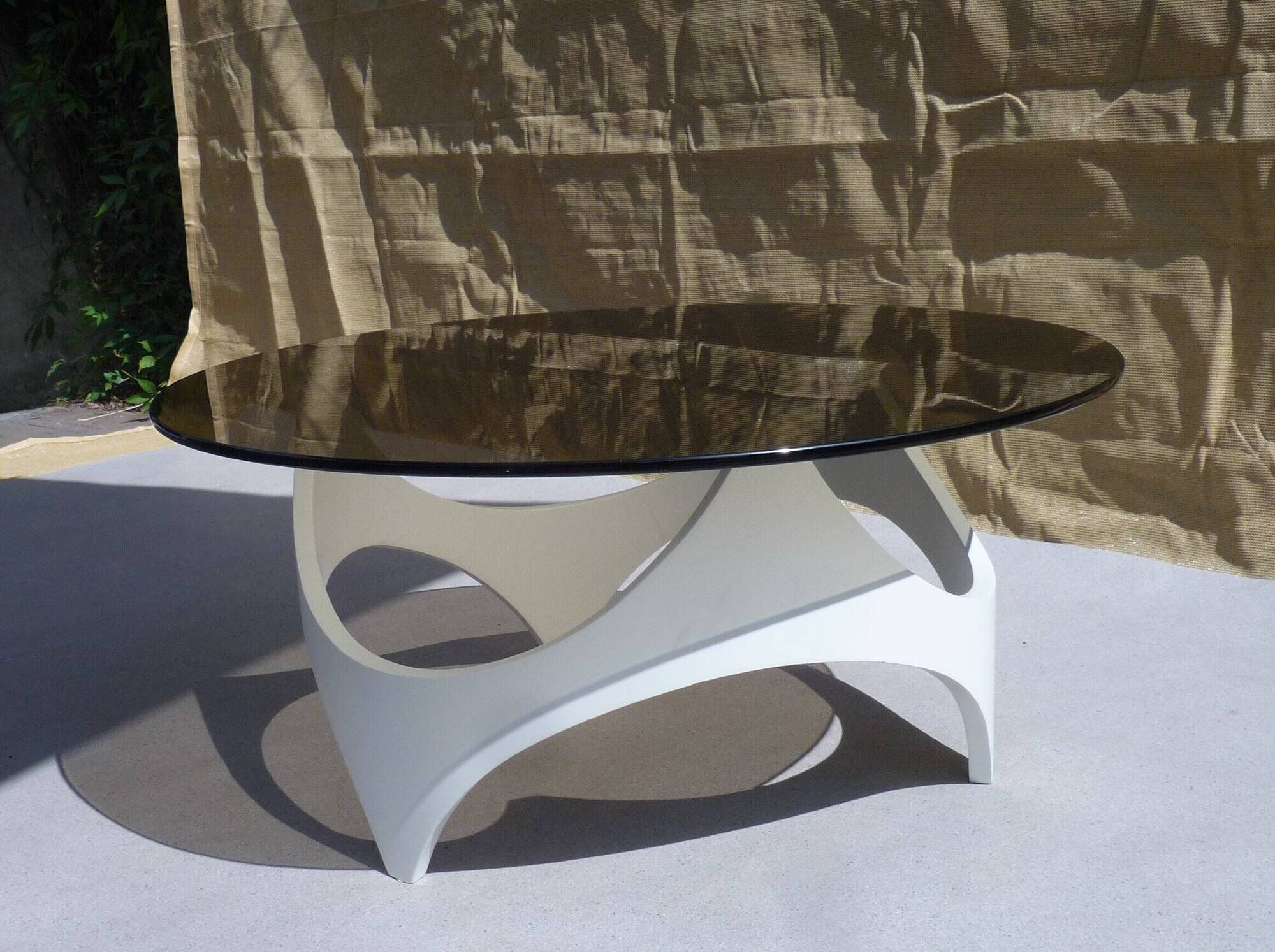 Coffee table space age wood and glass