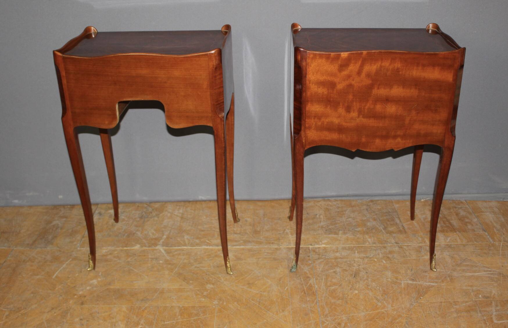 Pair of Louis XV style bedside tables in marquetry, 20th century.