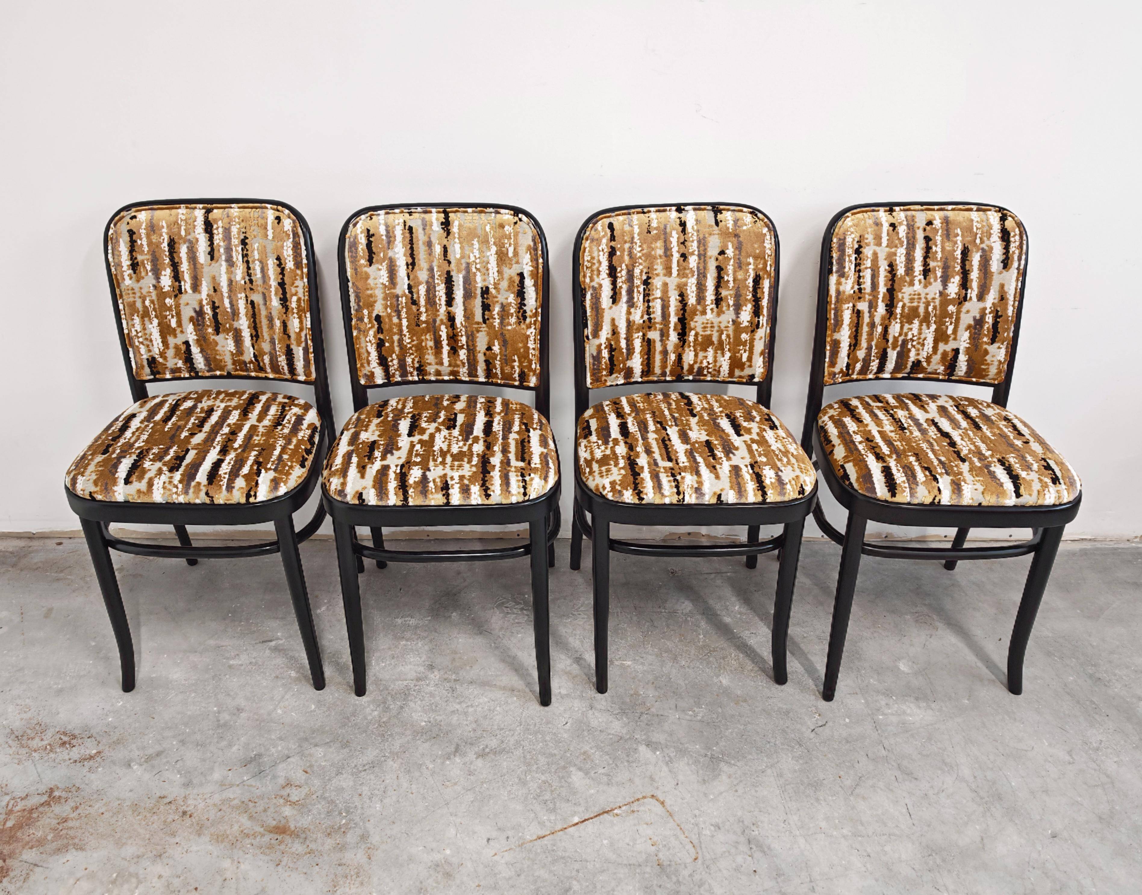 Set of 4 curved wood dining chairs by Josef Hoffmann for Mundus.