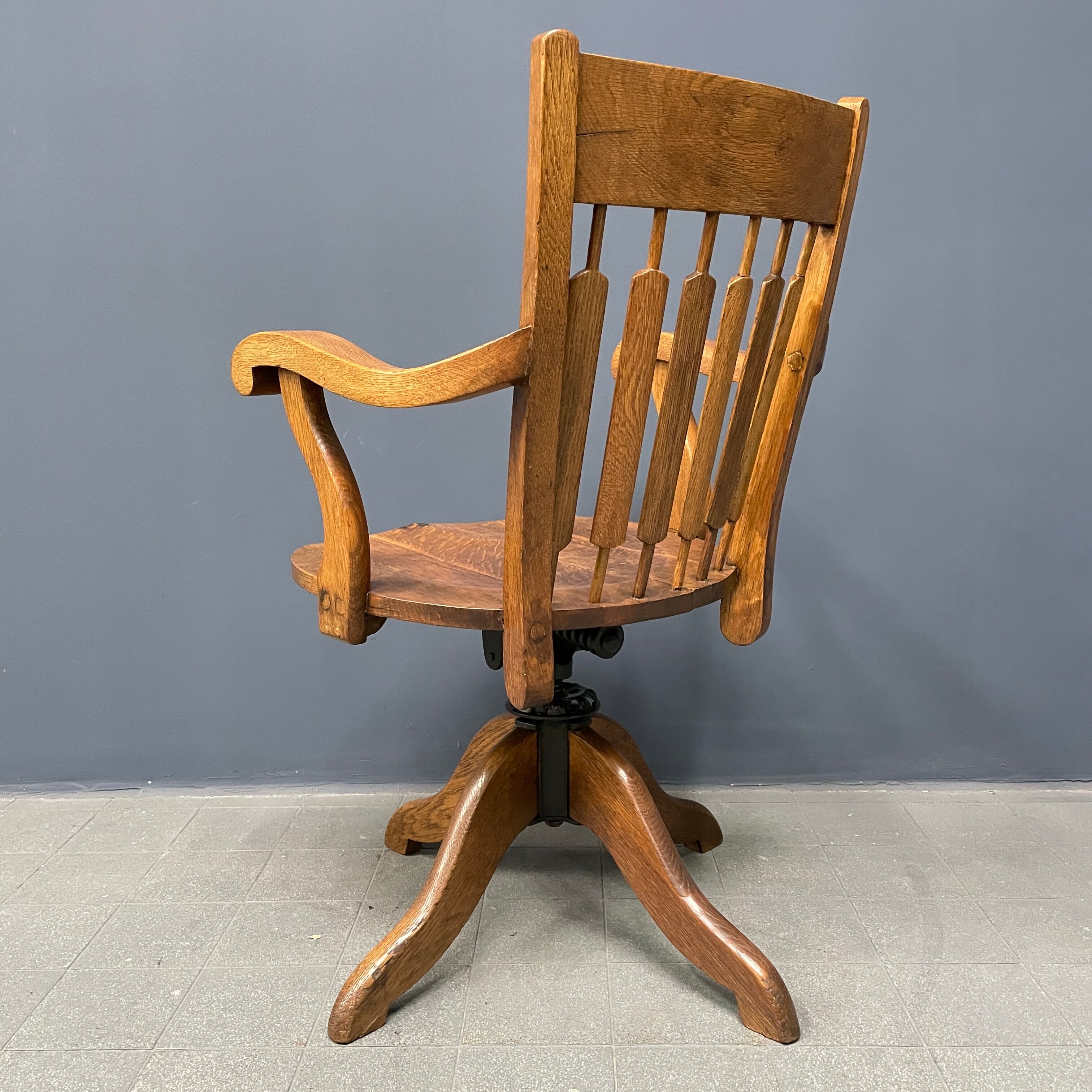 Antique American oak office chair with armrests 1920s