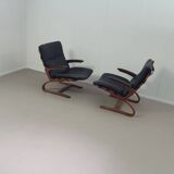 2 x Scandinavian black leather lounge chairs
