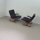 2 x Scandinavian black leather lounge chairs