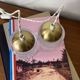 Pair of small portable tulip lamps in transparent glass.