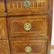 Dresser to music attributes of Louis XVl era