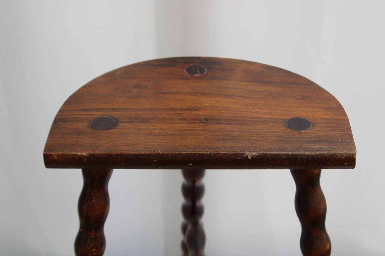 Wooden tripod stool
