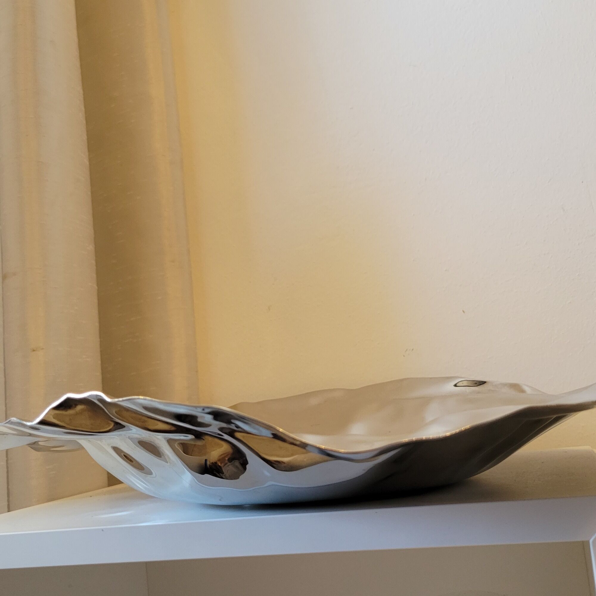 Alessi cut basket flat design Lluis Clotet in crumpled stainless steel