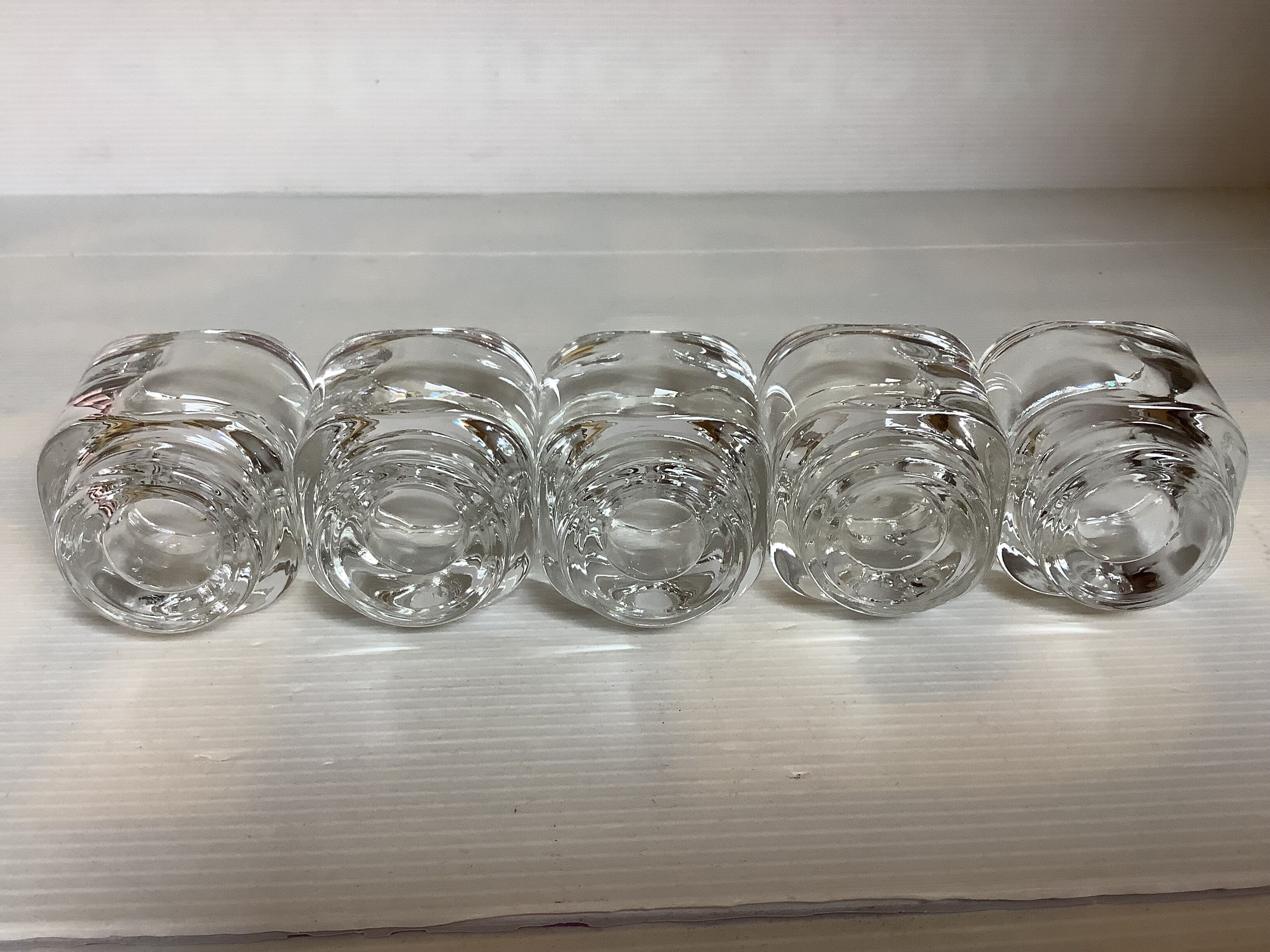 Five candle holders or egg cups designed by Joe Colombo.
