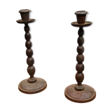 2 cast iron candlesticks