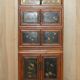 Antique Chinese armoire hand-carved around 1880 with country-style handles.