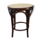 Low stool with canned seat and curved wood