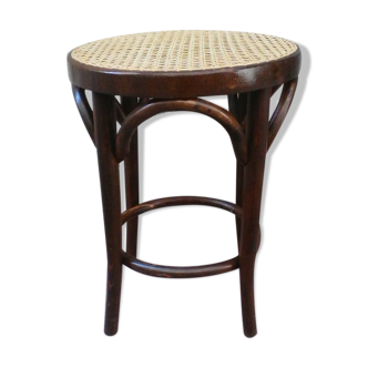Low stool with canned seat and curved wood