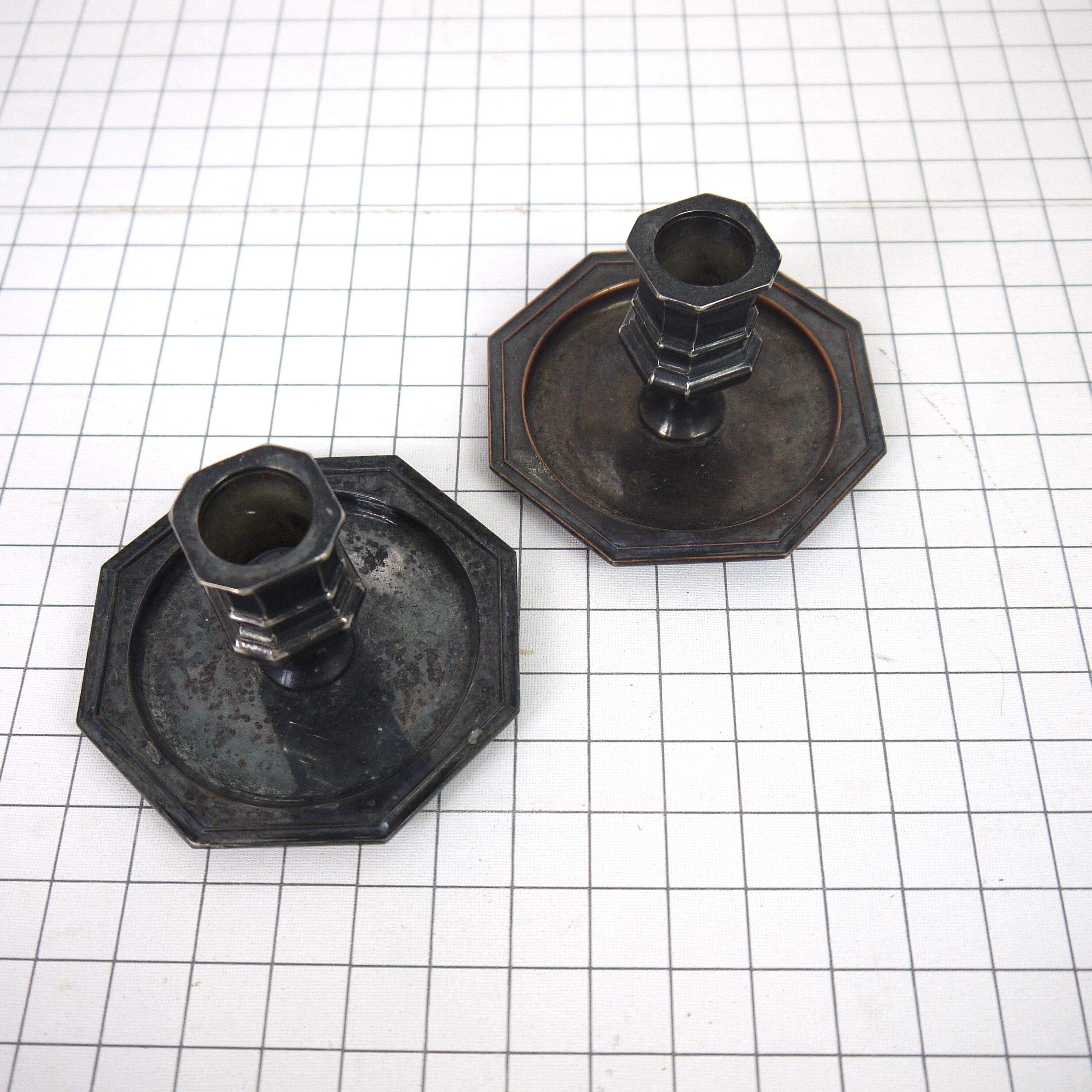 Pair of metal candlesticks