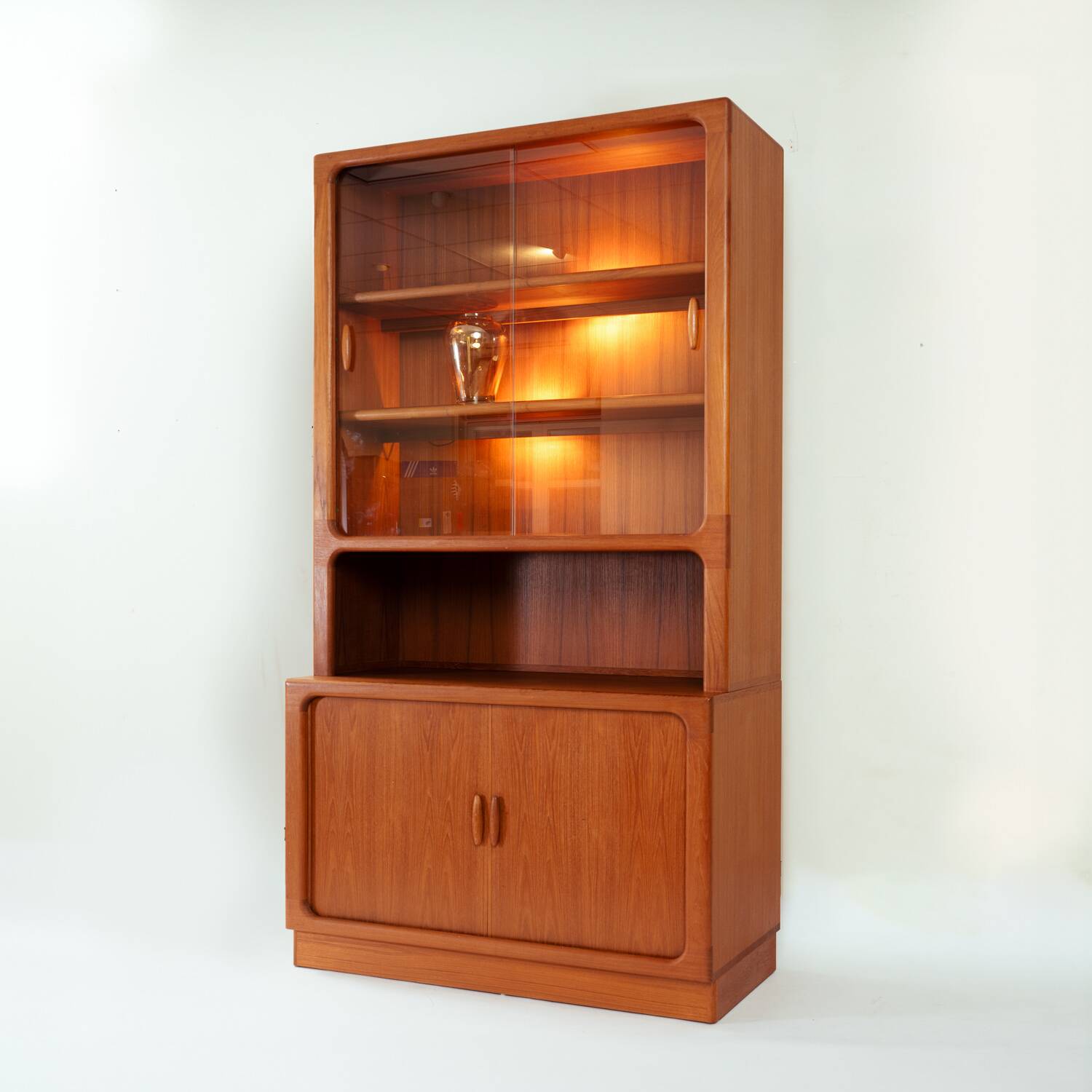Teak Dyrlund highboard display case with shutter doors