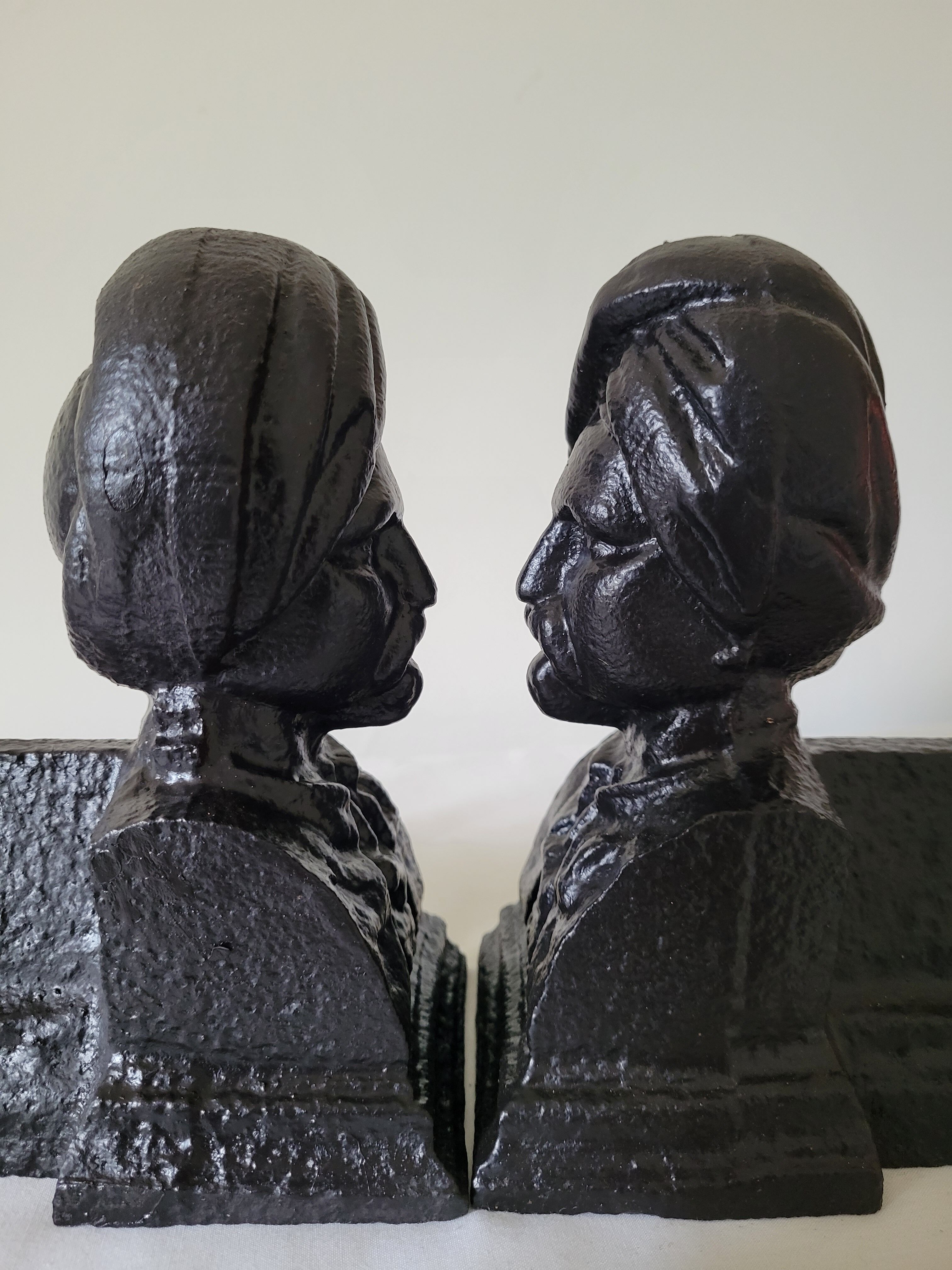 Pair of anthropomorphic cast iron chenets