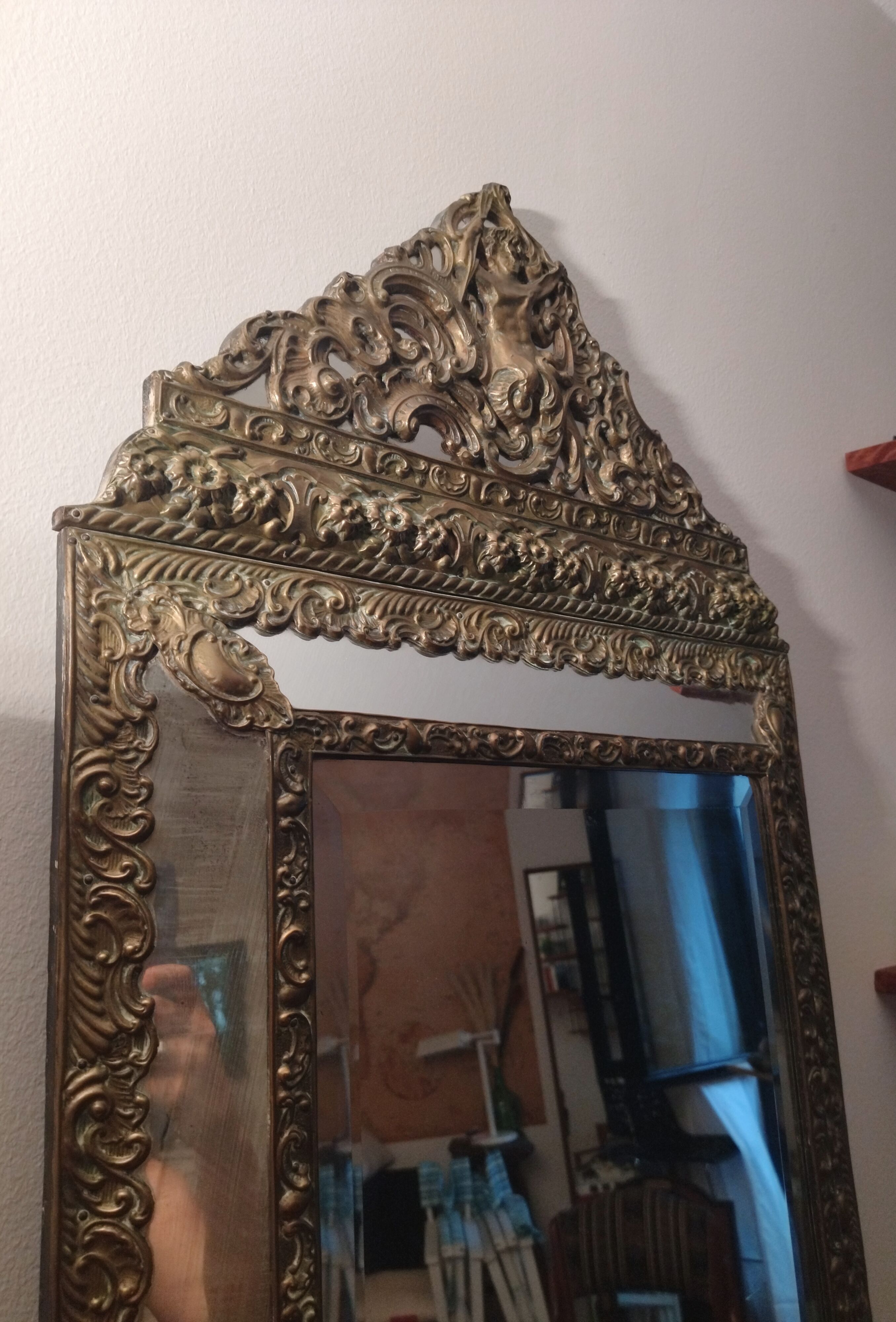 Repelled brass pareclose mirror