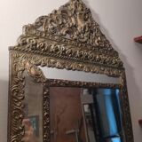 Repelled brass pareclose mirror