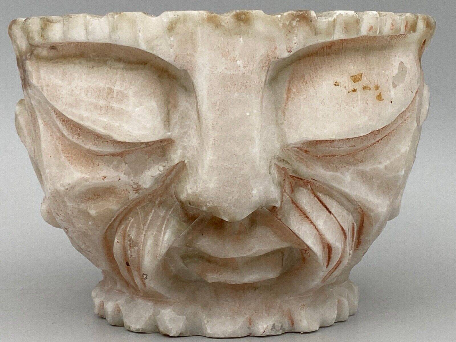 Pharmacy mortar and pestle in alabaster China man's face