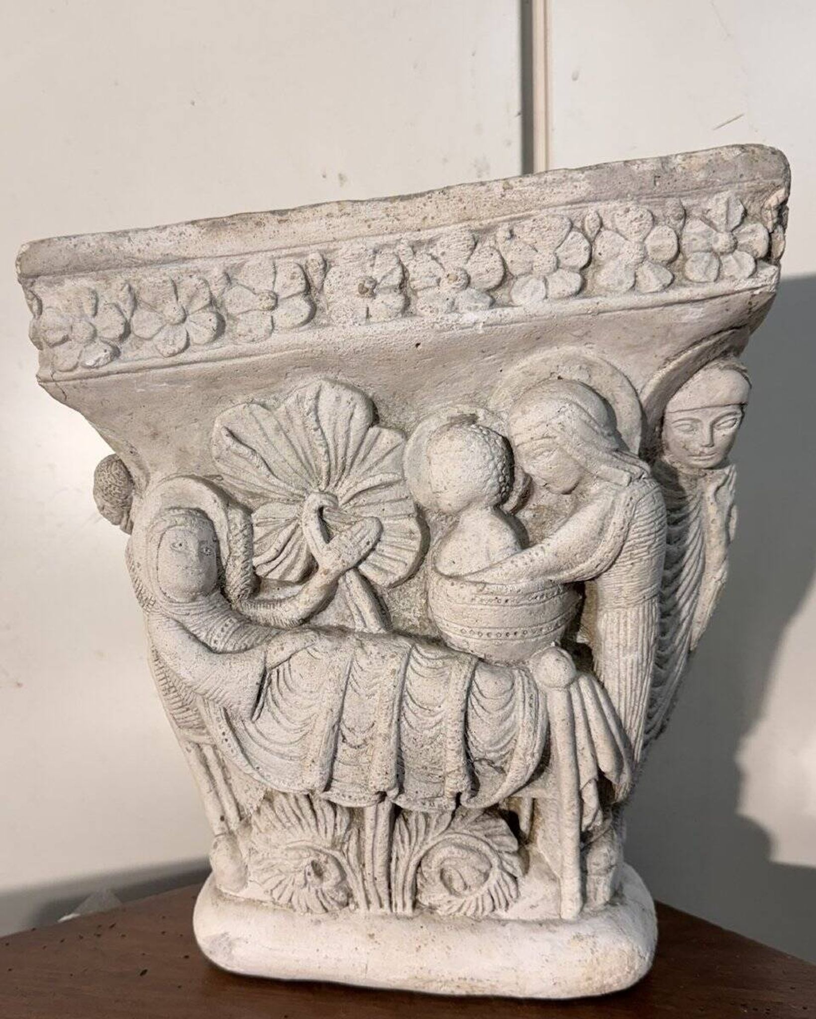Reconstituted stone capital