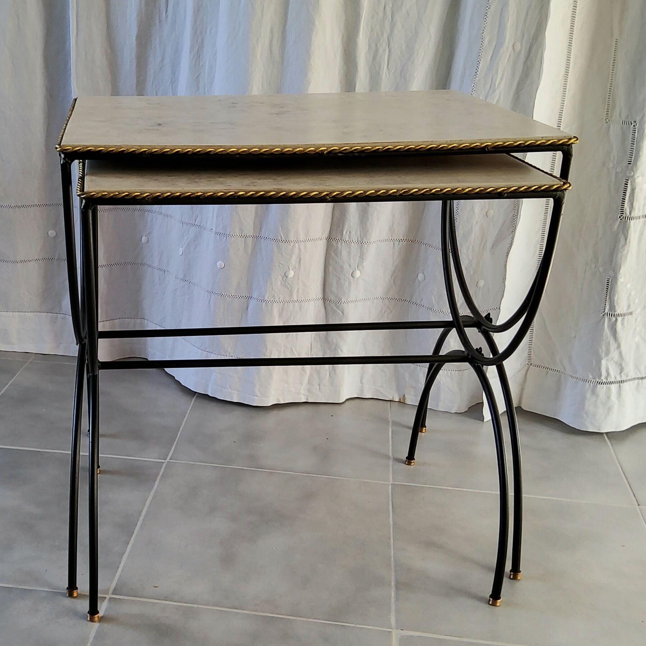 Pair of curule nesting tables