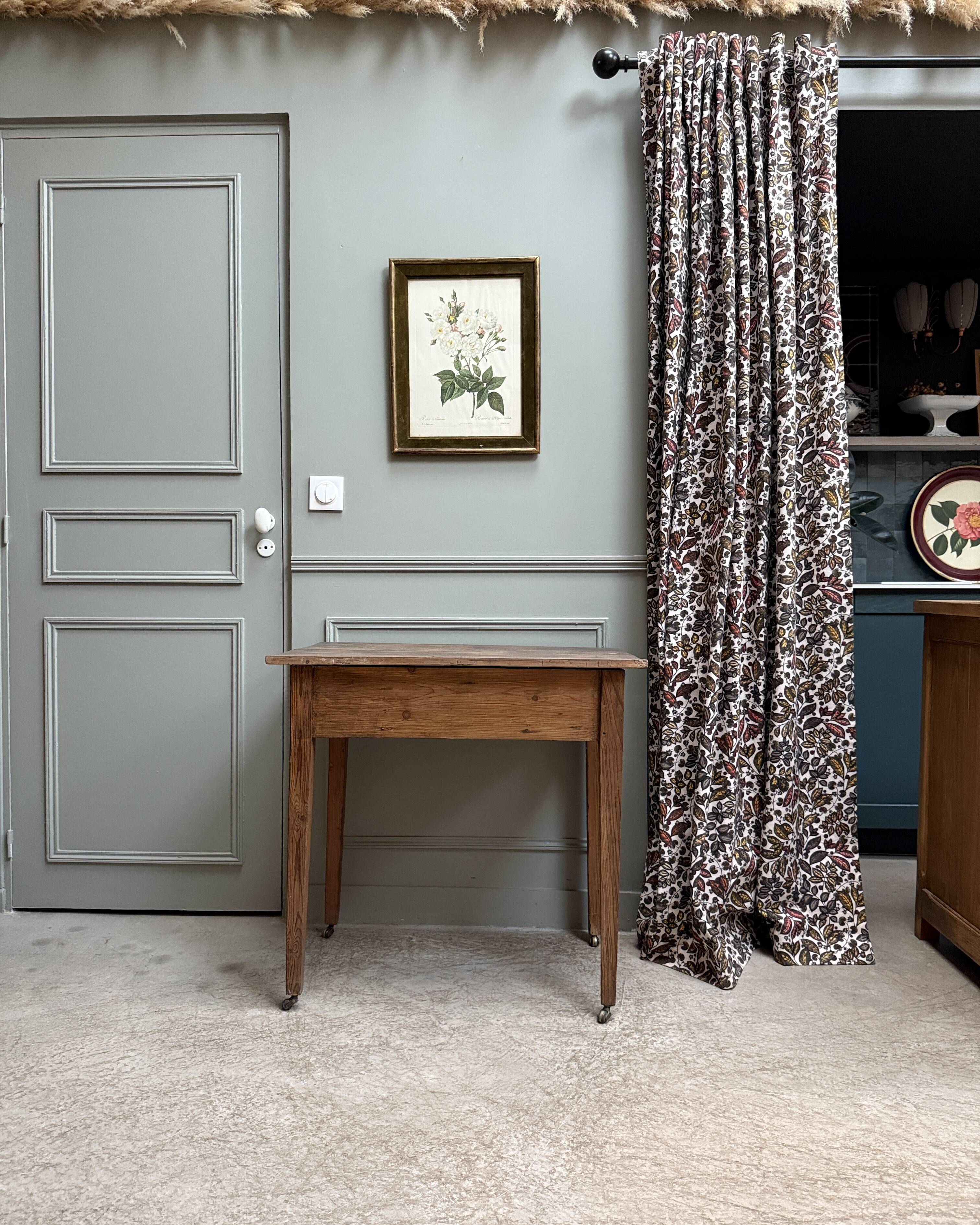 Small antique desk on wheels
