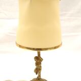 Lampe à poser cherubin en laiton.