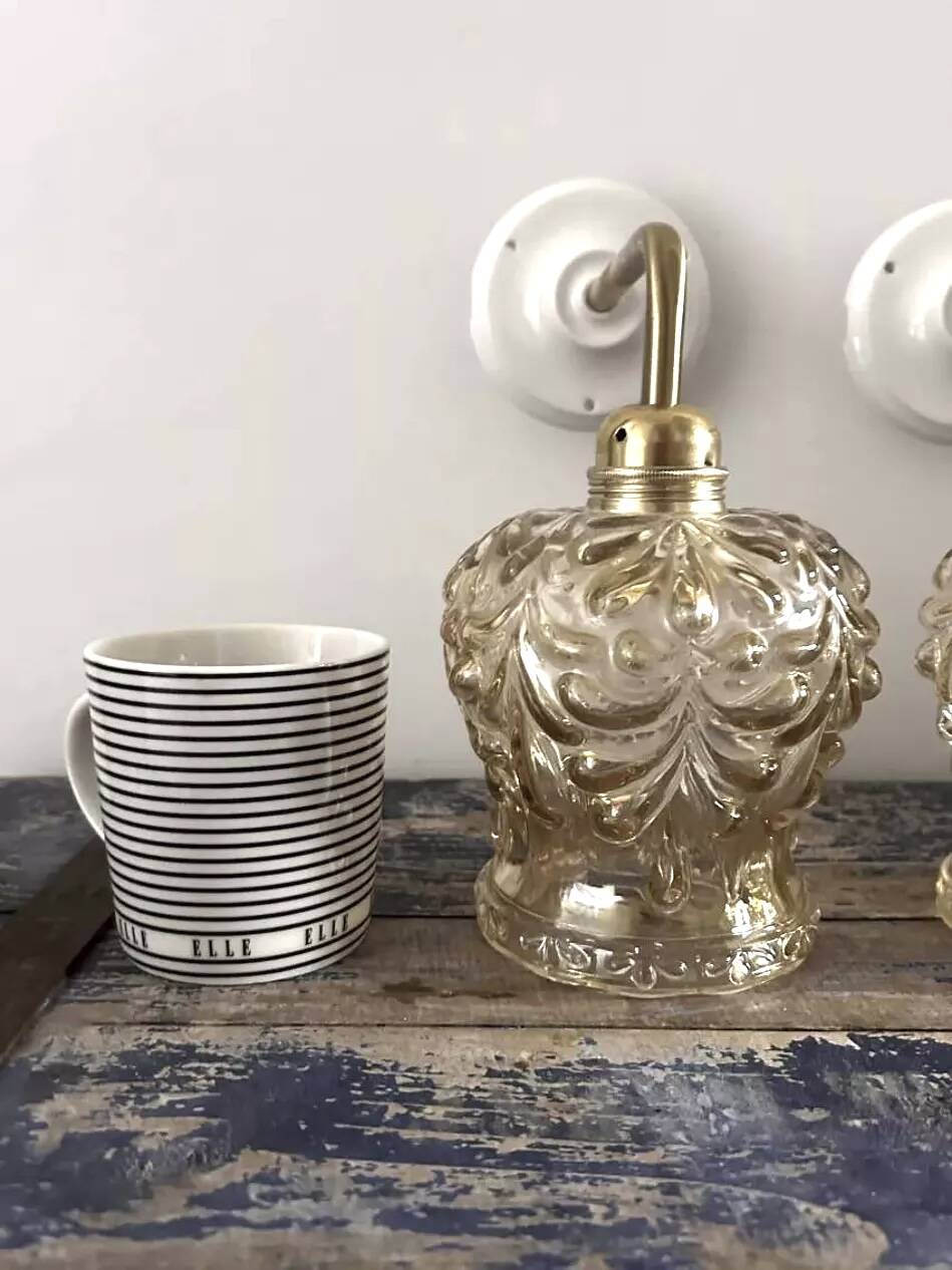 Pair of gold wall sconces