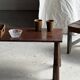 Table basse en teck brun de seconde main indonésienne pieds coniques H37 L8