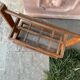 Old wooden bottle holder
