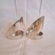 Pair of Paolo Gatti designer bottle holders