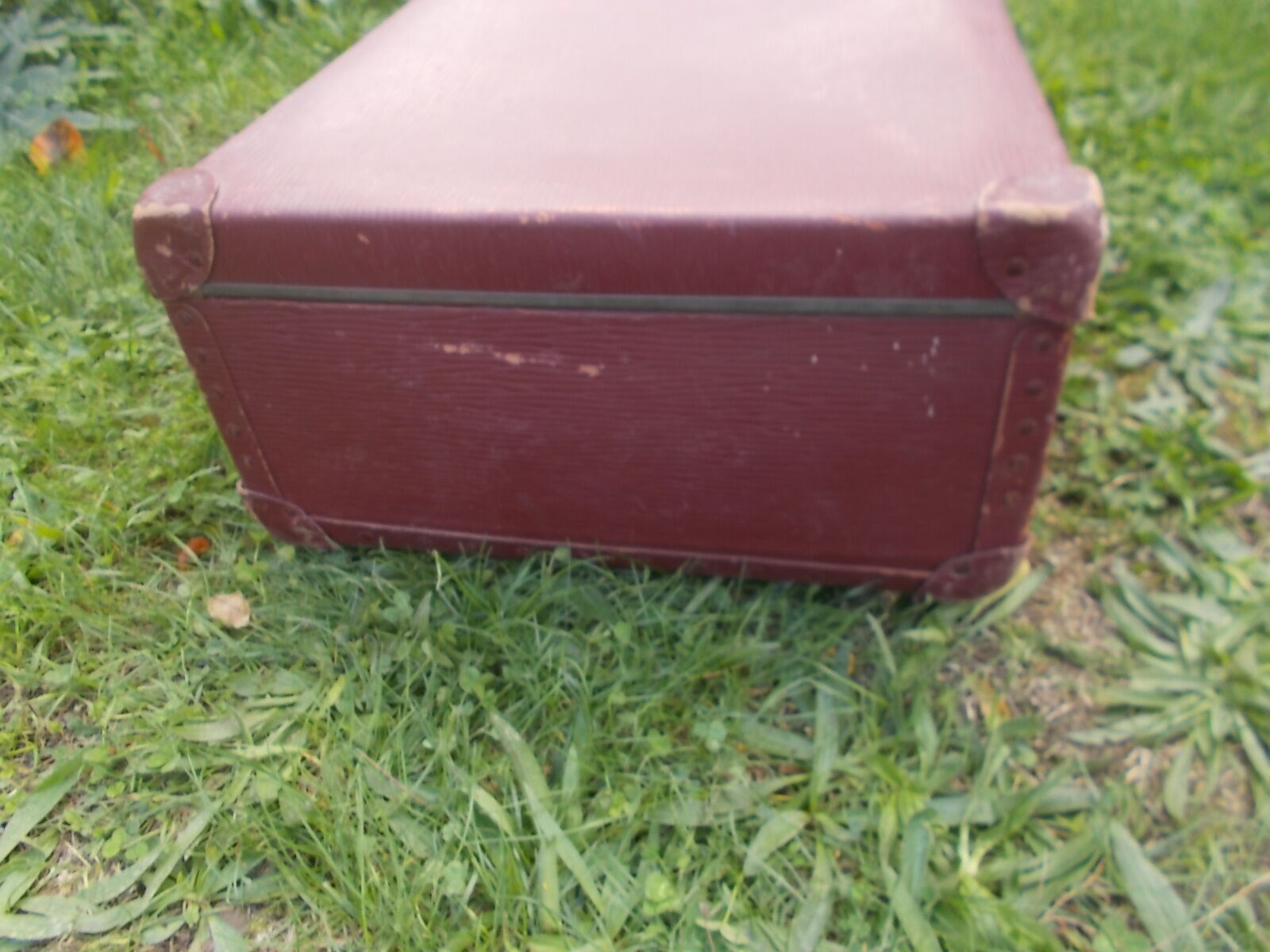 Vintage burgundy suitcase