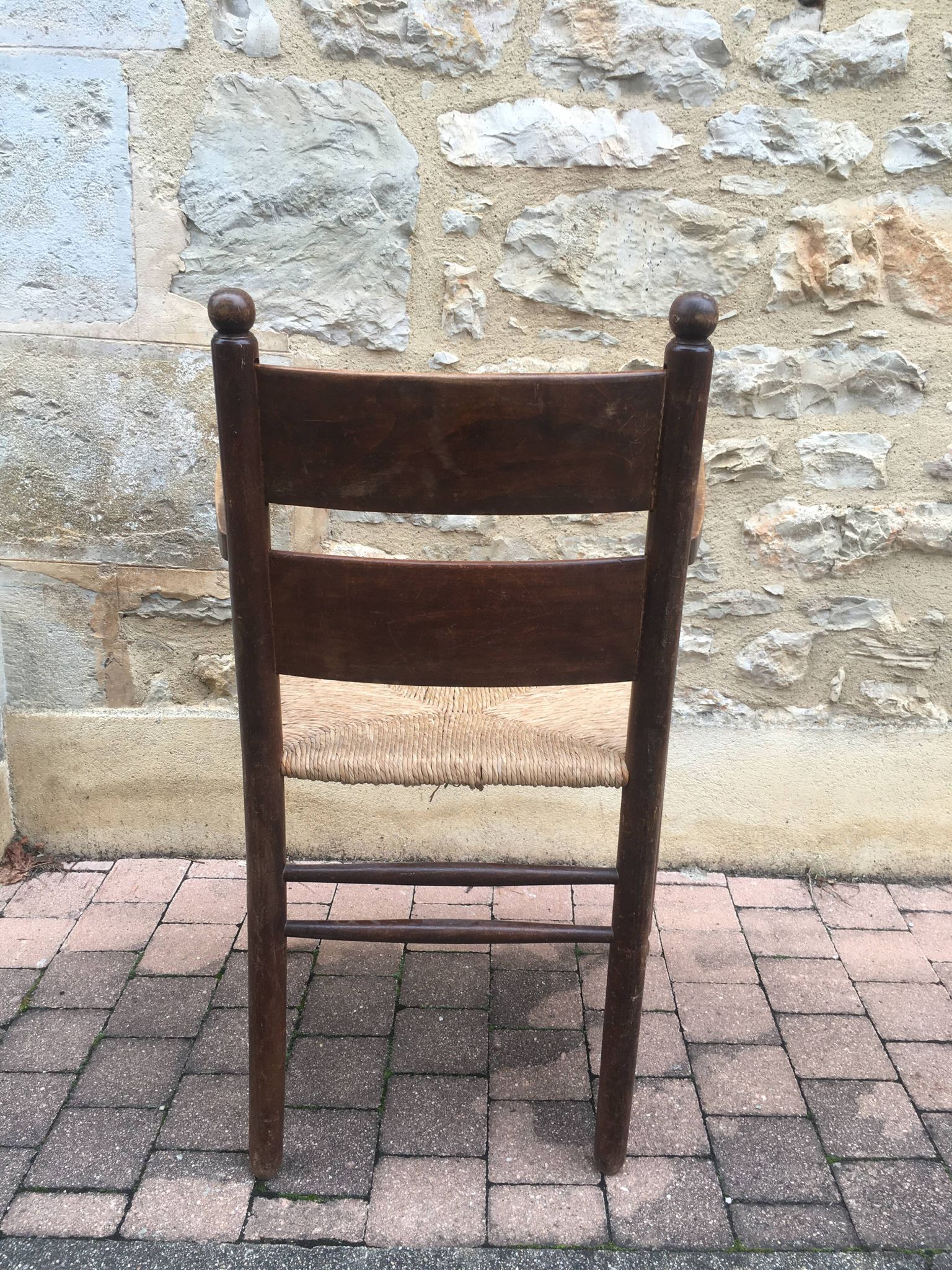Fauteuil paillé rustique