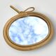 Vintage bamboo and rattan apple-shaped mirror - 1970s