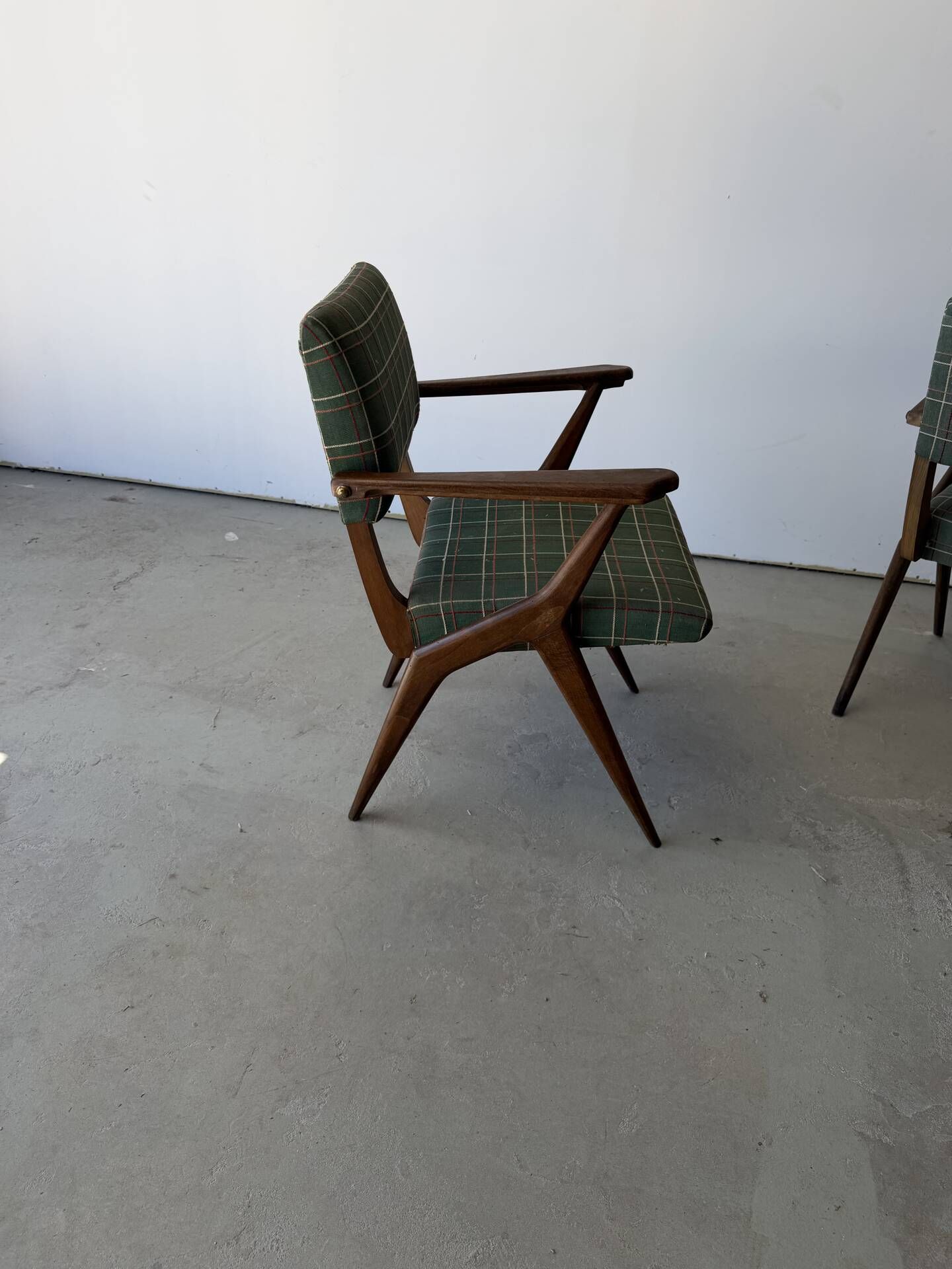 Pair of armchairs with a Scandinavian design in vintage teak from the 1960s.