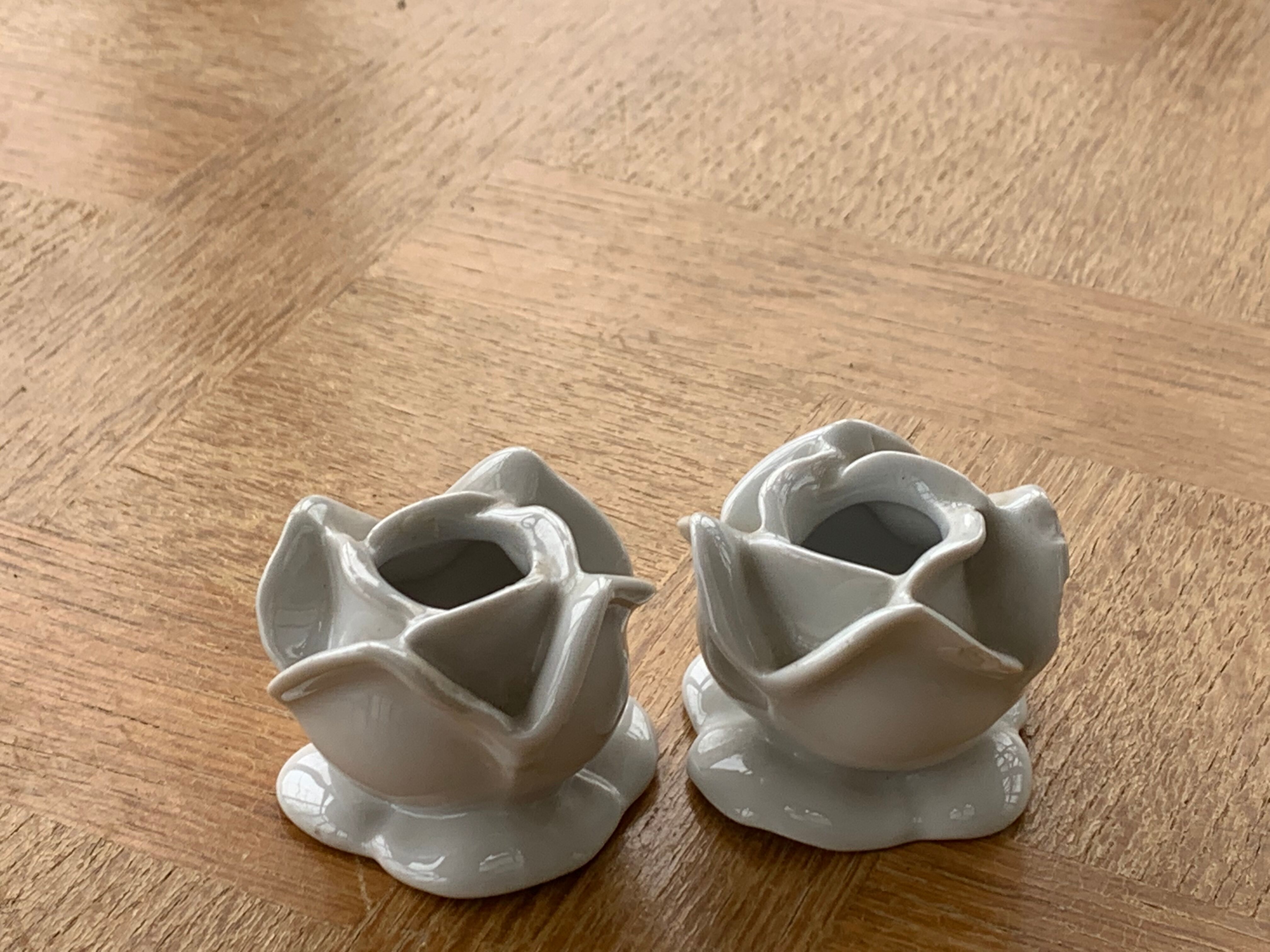Two vintage white porcelain flower candle holders