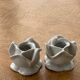 Two vintage white porcelain flower candle holders