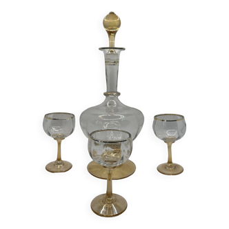 Set of liqueur carafe and three stemmed glasses
