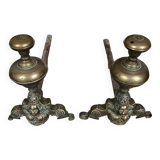 Pair of Louis XIV period andirons in gilded bronze circa 1700