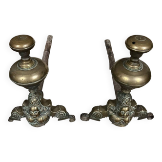 Pair of Louis XIV period andirons in gilded bronze circa 1700