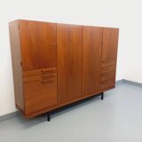 High Scandinavian modernist vintage sideboard in teak and black metal.