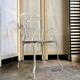Fauteuil de jardin en fer forgé blanc