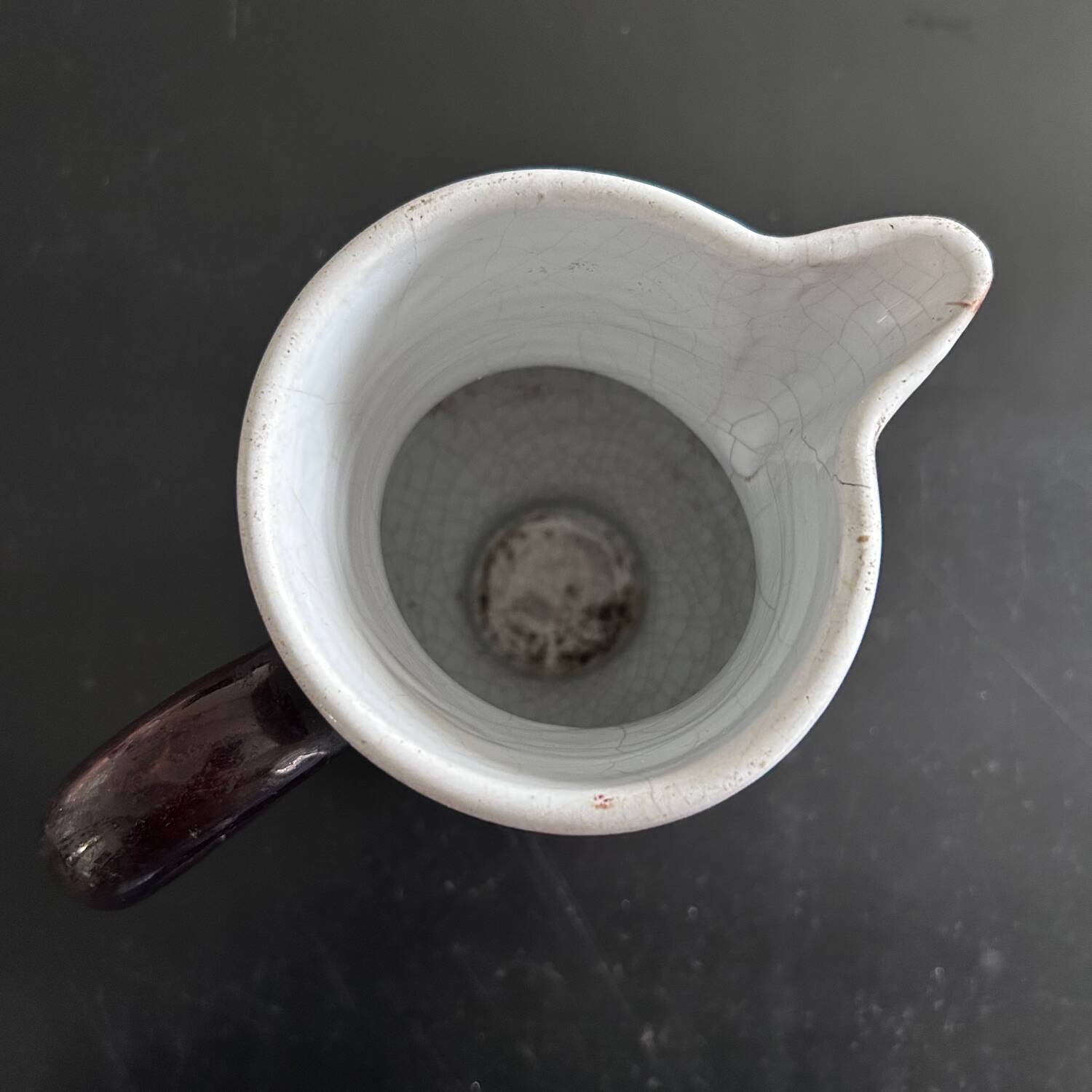 Antique tilted pitcher