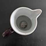 Antique tilted pitcher