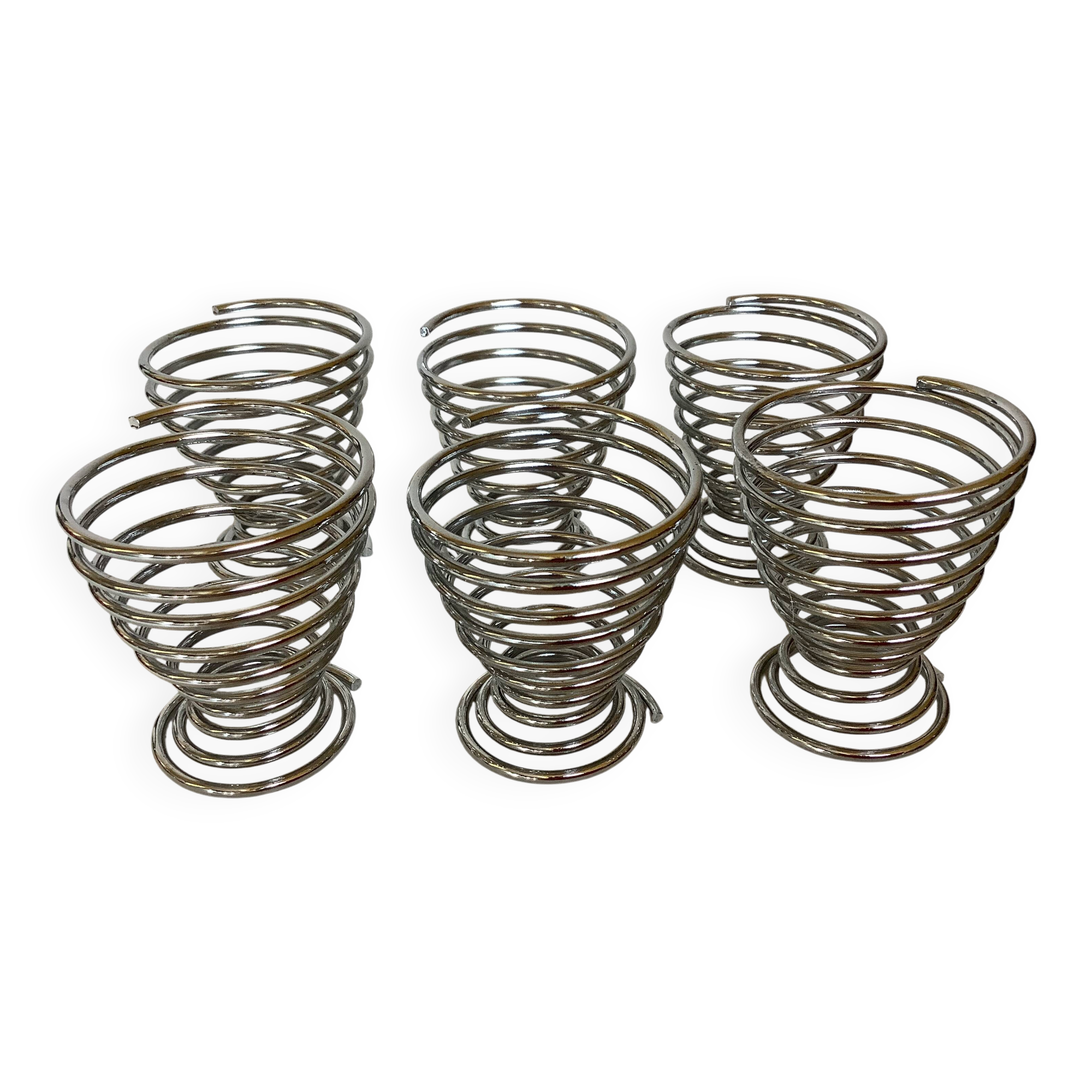 Six metal spiral egg cups