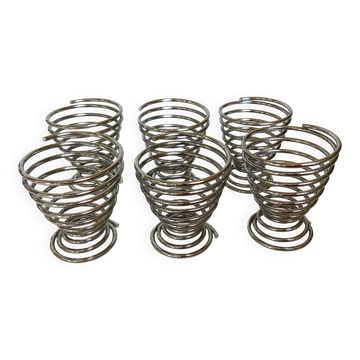 Six metal spiral egg cups