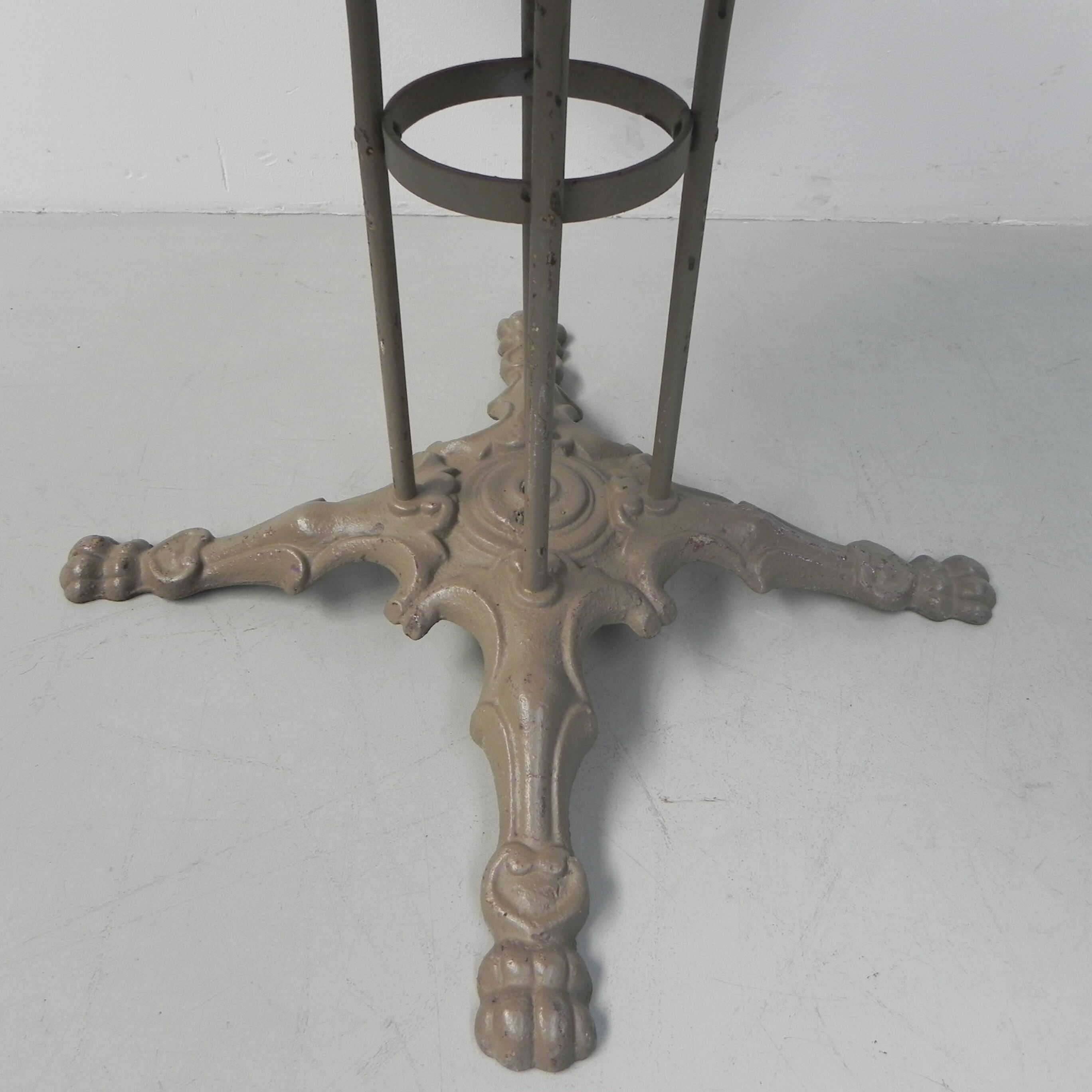 Steel garden table on cast iron base